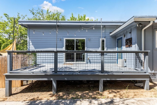 7611 Providence Ave Unit A, Austin, TX 78752 - rear view of house with a wooden deck