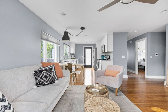 7611 Providence Ave Unit A, Austin, TX 78752 - living area featuring light wood-style floors, a ceiling fan, and recessed lighting