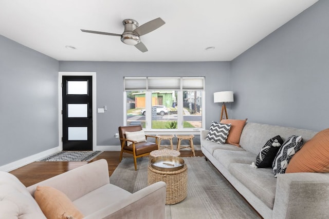 7611 Providence Ave Unit A, Austin, TX 78752 - living area featuring plenty of natural light, wood finished floors, and ceiling fan