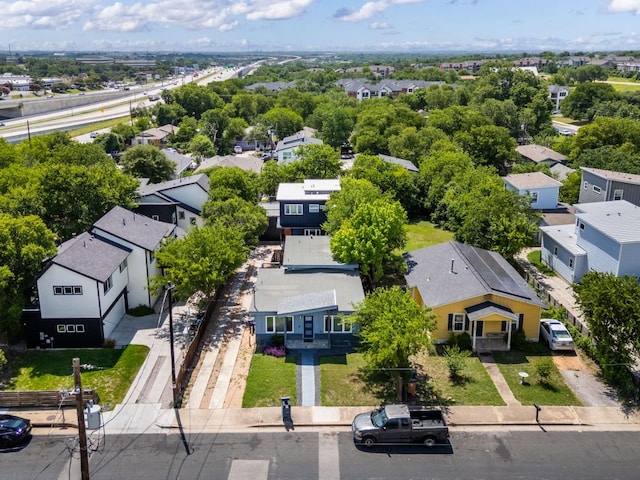 7611 Providence Ave Unit A, Austin, TX 78752 - aerial perspective of suburban area featuring a tree filled landscape
