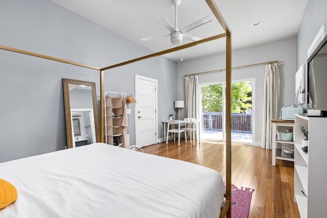 7611 Providence Ave Unit A, Austin, TX 78752 - bedroom featuring access to exterior, wood finished floors, and a ceiling fan