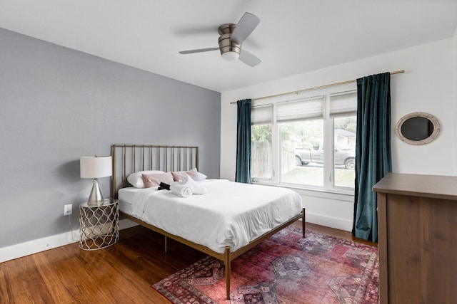 7611 Providence Ave Unit A, Austin, TX 78752 - bedroom featuring wood finished floors and ceiling fan