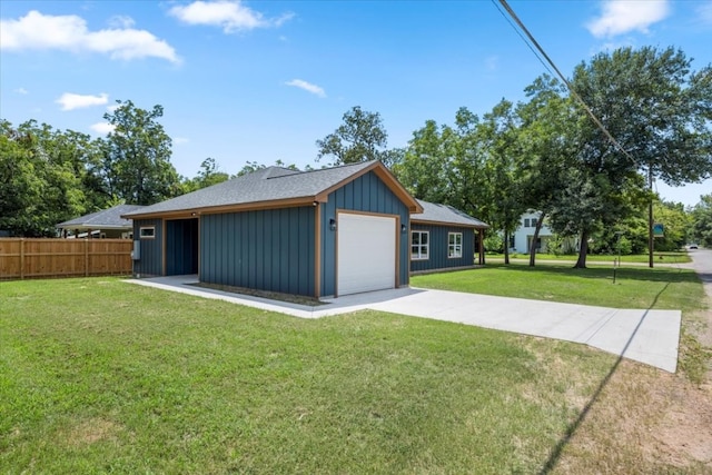 garage featuring a yard