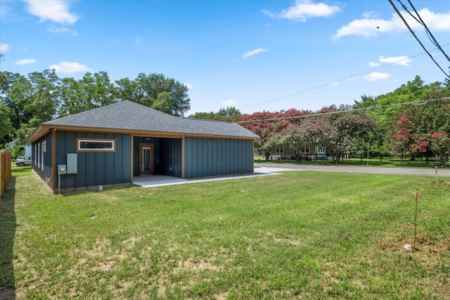 exterior space with a yard