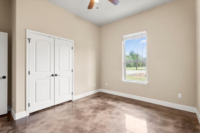 unfurnished bedroom featuring a closet and ceiling fan