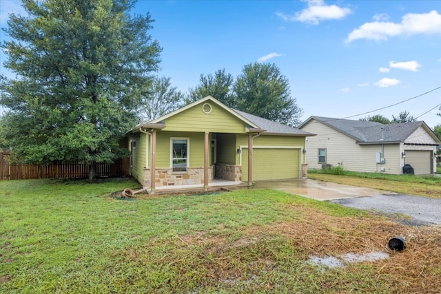 view of front of house with a front yard and covered porch