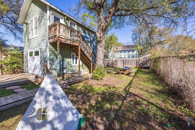 rear view of house with a deck