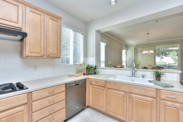 kitchen with stainless steel dishwasher, black gas stovetop, sink, decorative light fixtures, and a notable chandelier