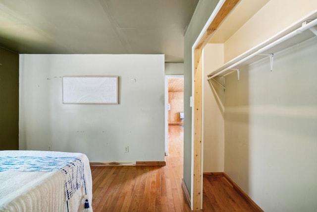 bedroom with wood-type flooring