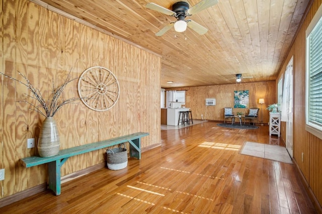 192 Carmen Hill Ln, Bastrop, TX 78602 - living room featuring wood ceiling, wood-type flooring, wood walls, and ceiling fan
