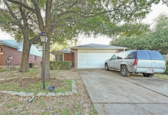 view of front of house featuring central AC and a garage