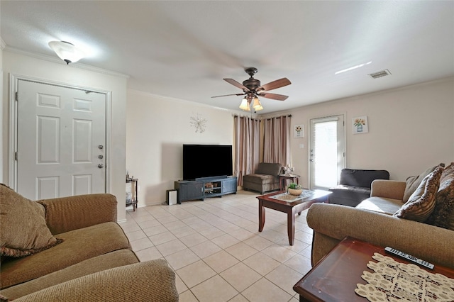 living room with ceiling fan, light tile patterned floors, and crown molding