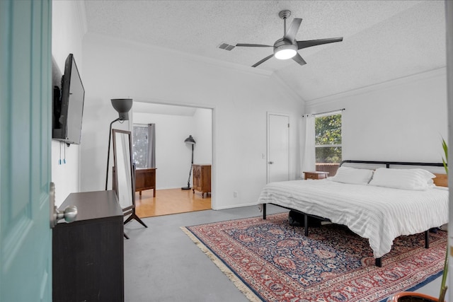 bedroom with a textured ceiling, vaulted ceiling, ceiling fan, and crown molding