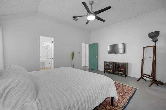 bedroom with a textured ceiling, ensuite bathroom, vaulted ceiling, and ceiling fan