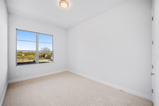 unfurnished room with carpet floors