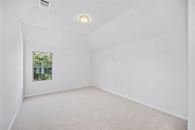 additional living space with light carpet and lofted ceiling