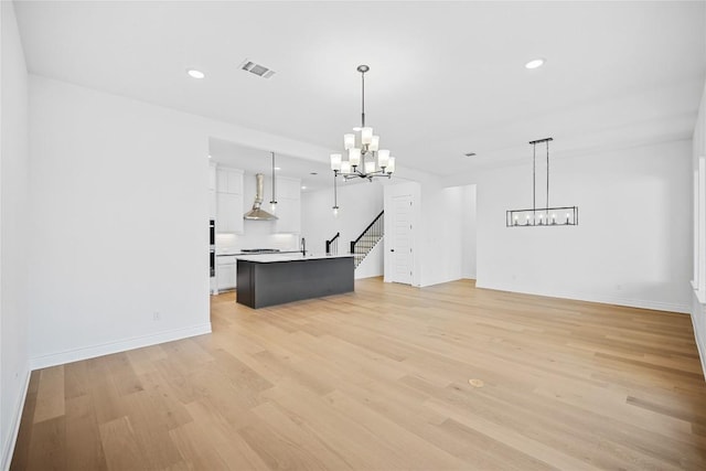 interior space with sink and light wood-type flooring