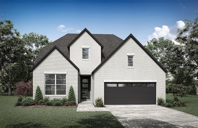 view of front facade with a front yard and a garage