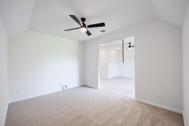 1509 Jay Wolf, Georgetown, TX 78628 - spare room with ceiling fan, vaulted ceiling, light colored carpet, and baseboards