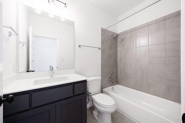 1509 Jay Wolf, Georgetown, TX 78628 - bathroom featuring toilet, vanity, washtub / shower combination, and tile patterned flooring