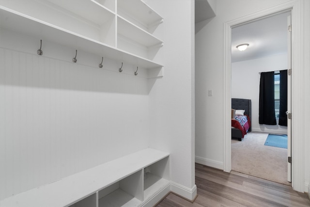 mudroom with light hardwood / wood-style flooring