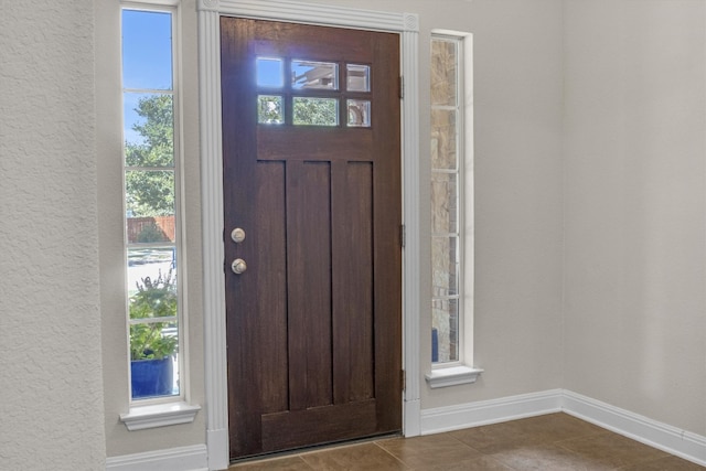 entryway with tile patterned flooring