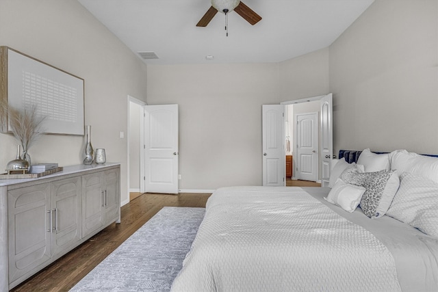 bedroom featuring ceiling fan and dark hardwood / wood-style flooring