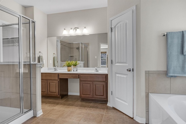 bathroom with tile patterned flooring, vanity, and independent shower and bath