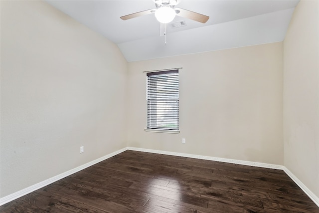 spare room featuring ceiling fan, dark hardwood / wood-style flooring, and lofted ceiling