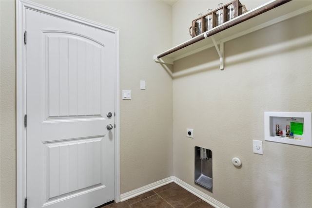 laundry area featuring hookup for a washing machine, dark tile patterned flooring, gas dryer hookup, and electric dryer hookup