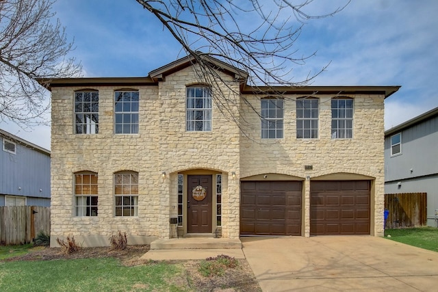 view of front of home with a garage