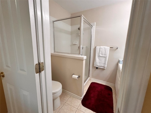 bathroom with walk in shower, tile patterned flooring, and toilet