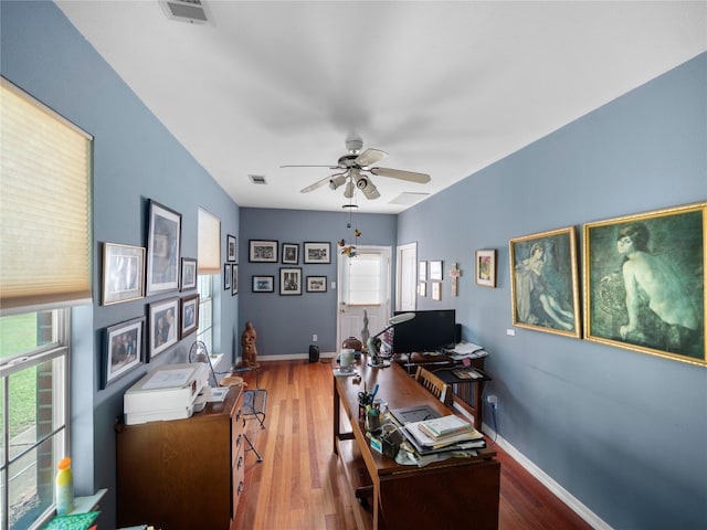 office space with wood-type flooring and ceiling fan