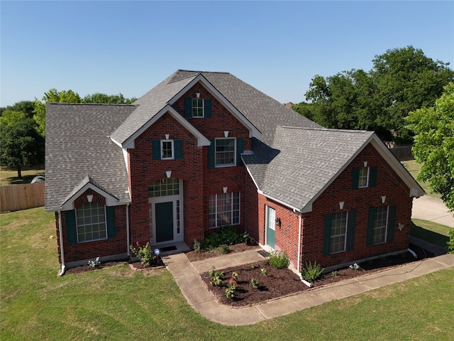 view of front facade with a front lawn