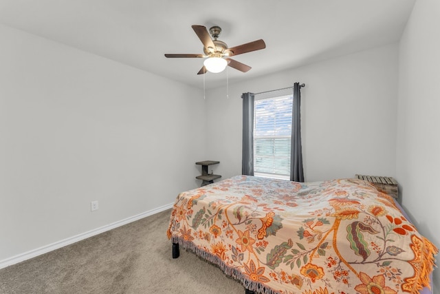 bedroom featuring ceiling fan and carpet floors