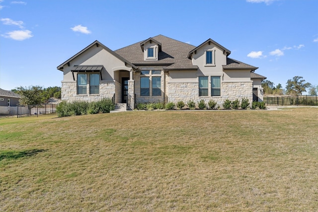 view of front facade with a front lawn