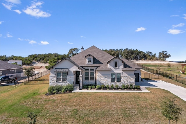 view of front of home with a front yard