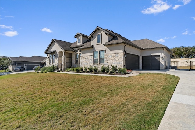 view of front of property featuring a garage and a front yard