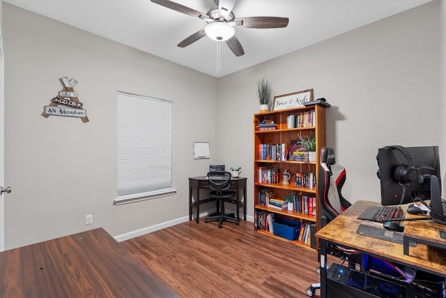 office area with wood-type flooring and ceiling fan