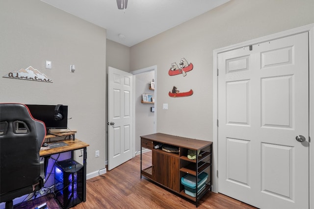 office space with hardwood / wood-style flooring