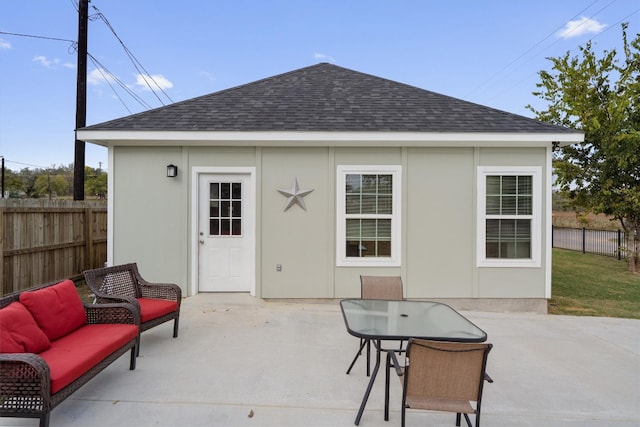 exterior space featuring a patio area and an outdoor living space