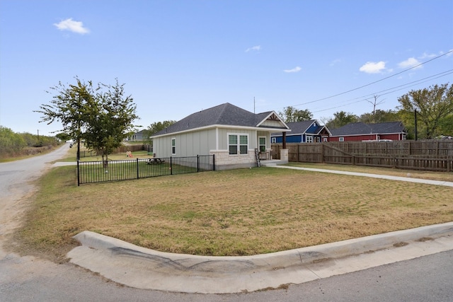 view of front of home with a front lawn