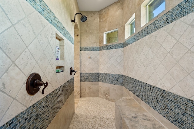 bathroom featuring tiled shower