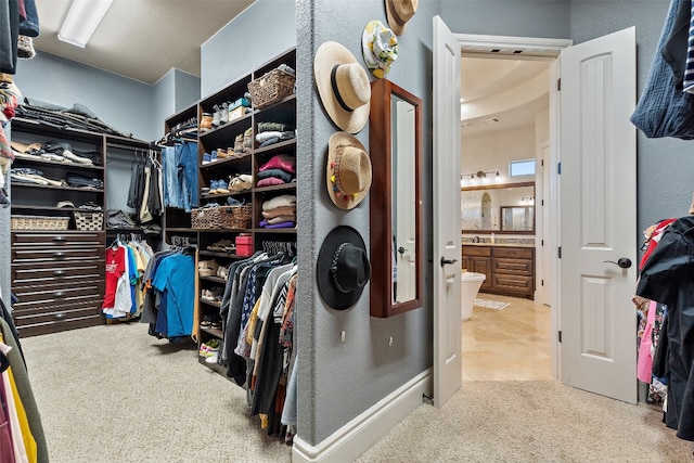 spacious closet with carpet flooring