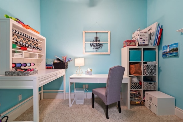 office area featuring carpet and baseboards