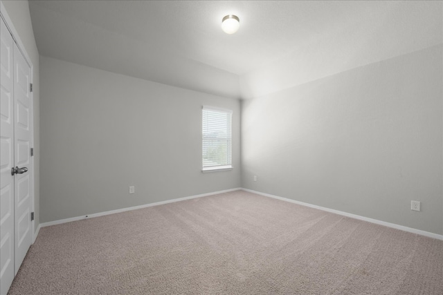 empty room with carpet floors