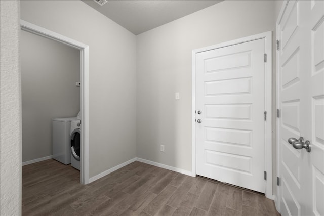 laundry area with hardwood / wood-style flooring