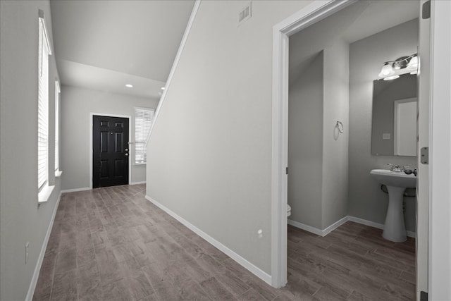 hallway featuring hardwood / wood-style floors