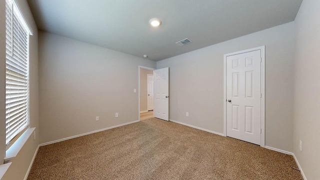 1355 Brookfield St, Temple, TX 76504 - unfurnished bedroom featuring light carpet