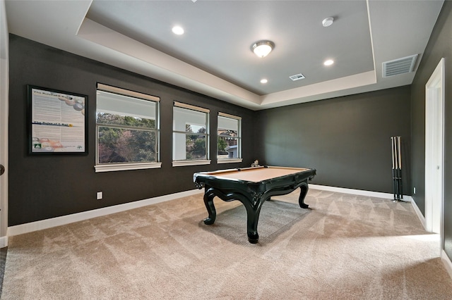 playroom with light carpet, billiards, and a raised ceiling